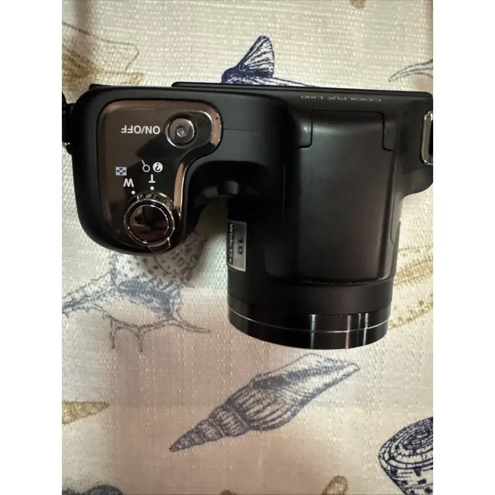 Nikon Black Camera with Matching Black Carry Case and Red Trim